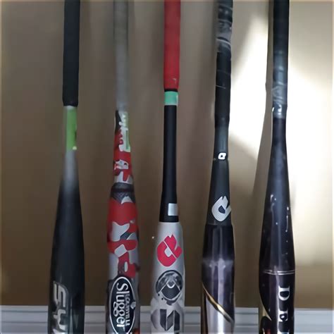 One-Pieces, Overalls & Jum Uniforms. . Used demarini softball bats